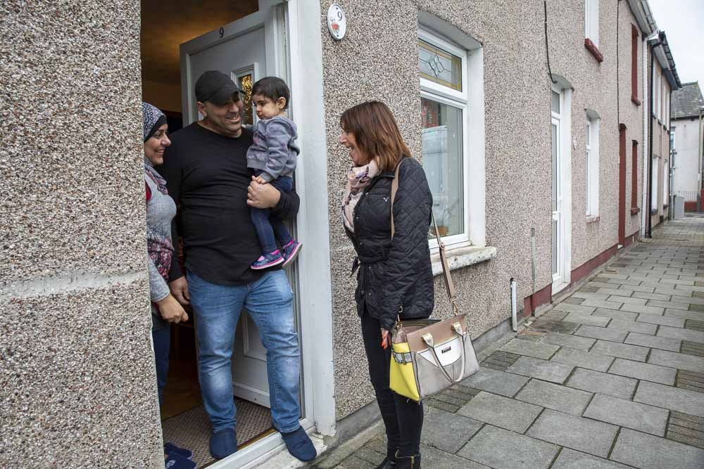 Volunteer visiting a family